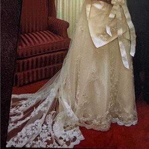 Ivory wedding dress. Used once. Size 12-14.